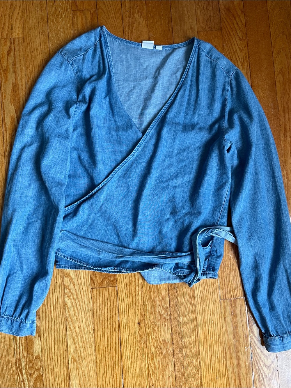 GAP Denim-Feel Wrap Front Long Sleeve Top in Blue